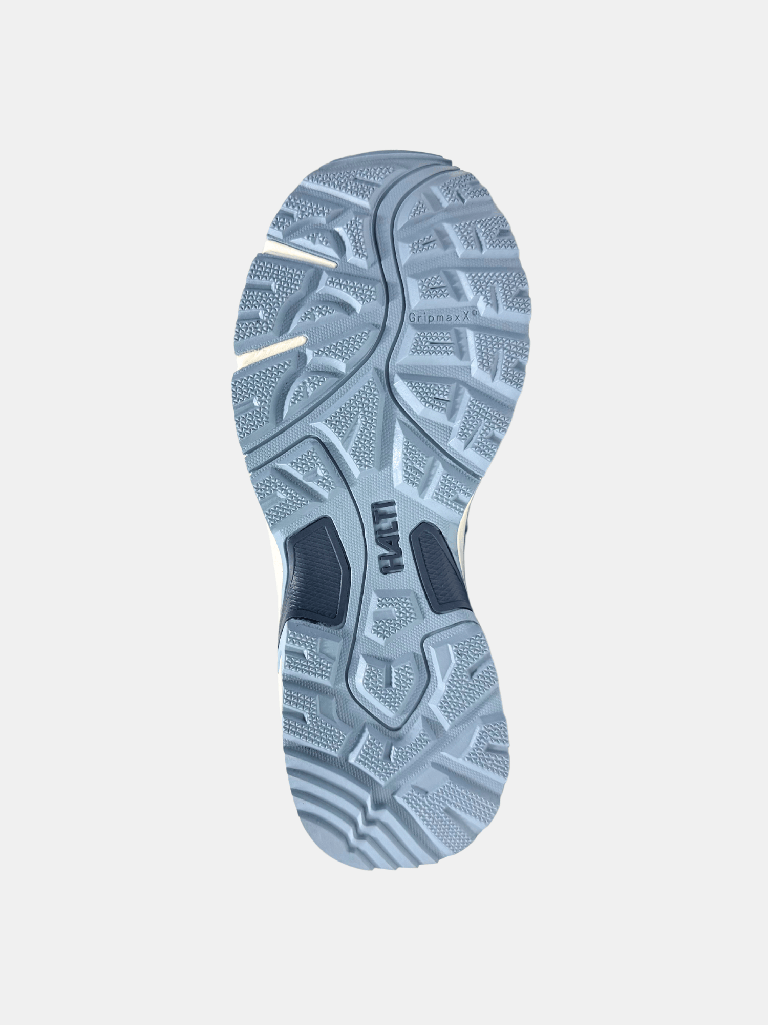 En närbild av GripmaxX Antislip-sulan på Halti Outdoorskor DX Low Dam visar dess blågrå strukturerade slitbana.