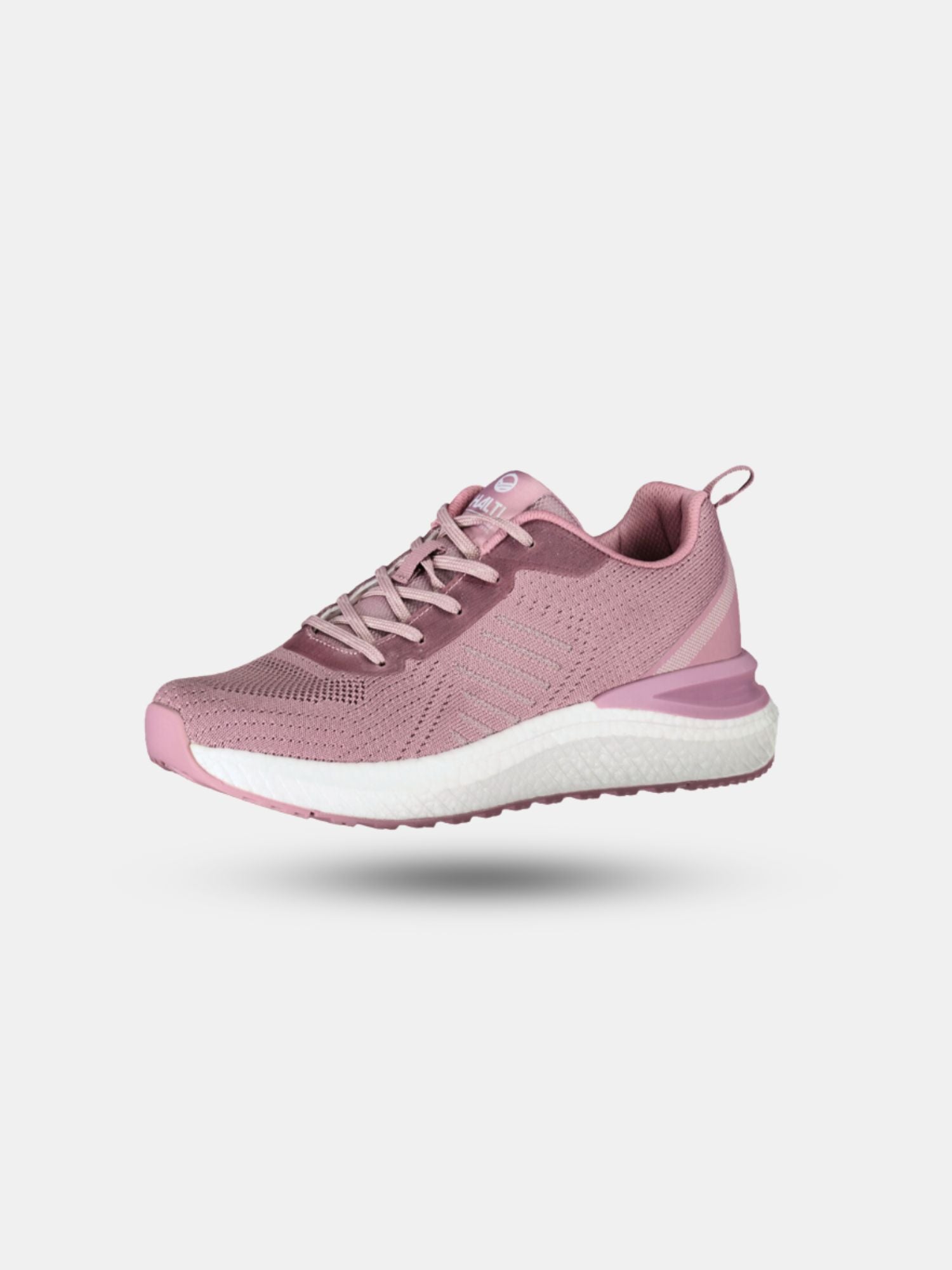 En rosa Halti Gale Sneaker Dam med mesh-ovandel i återvunnen polyester och vit sula, visad mot vit bakgrund.