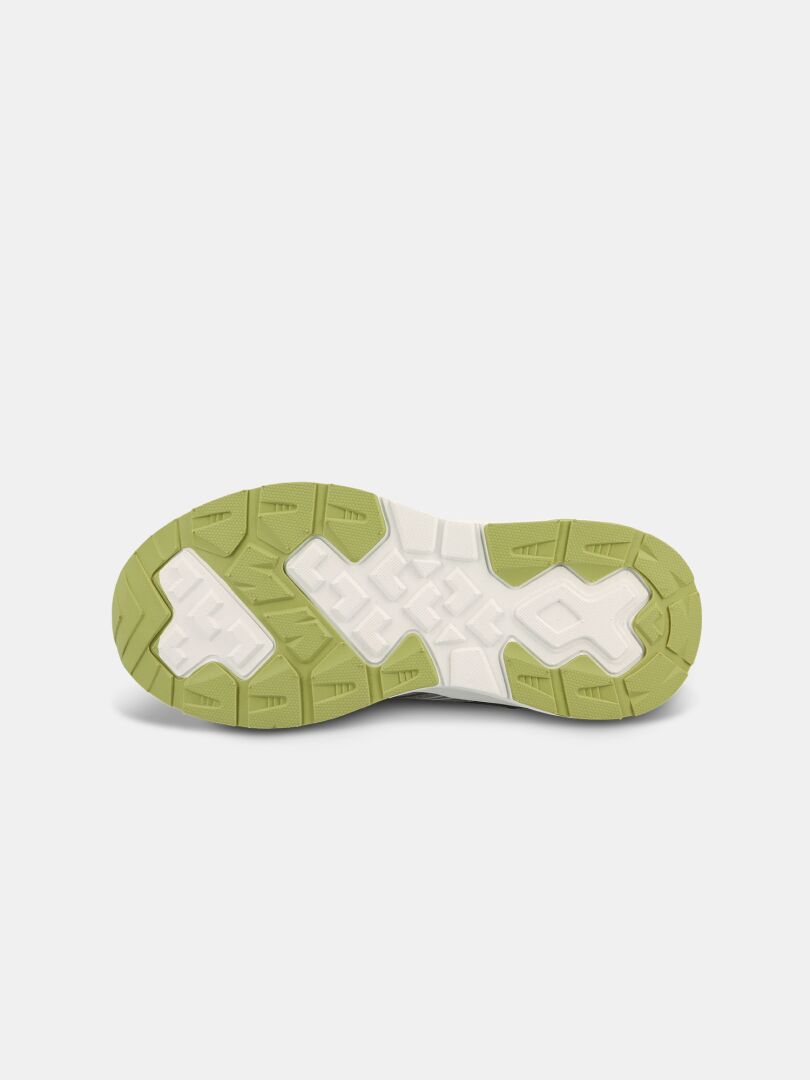 En grön och vit sula med geometriskt mönster från Halti Zuma 2 DX Sneaker Junior, avbildad mot en vit bakgrund.