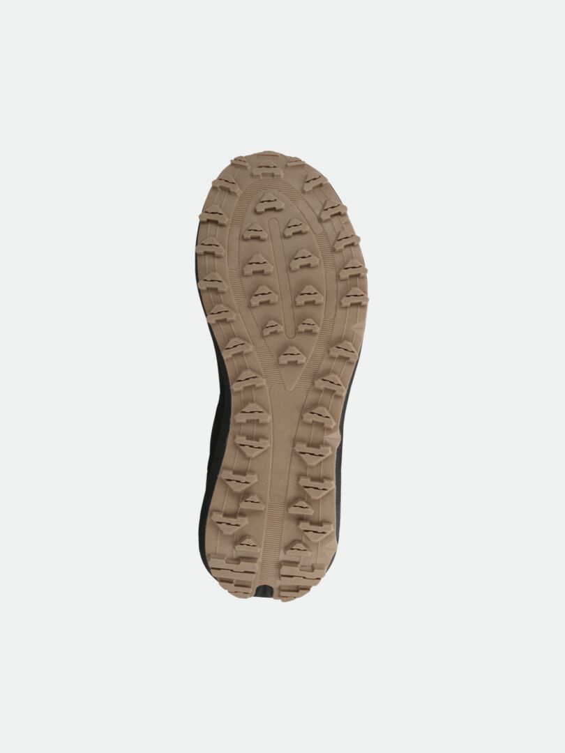 Undersidan av Halti Morgam Mid DX Outdoorskor Dam med en beige gummiyta och grov mönstrad sula mot en vit bakgrund.