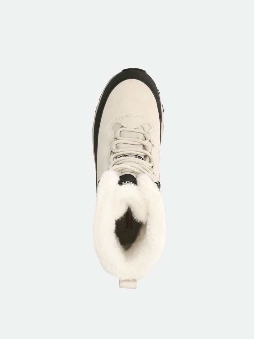 Halti Tornio 2 DX Vinterskor i beige med vitt fleecefoder, snörning och tåhätta i svart gummi.