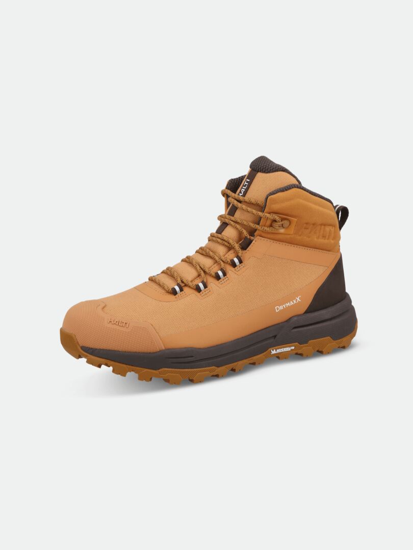 Halti Hiker Kuru 2 DX herrsko i tan med bruna detaljer och svart Michelin-sula, visad från sidan på vit bakgrund.