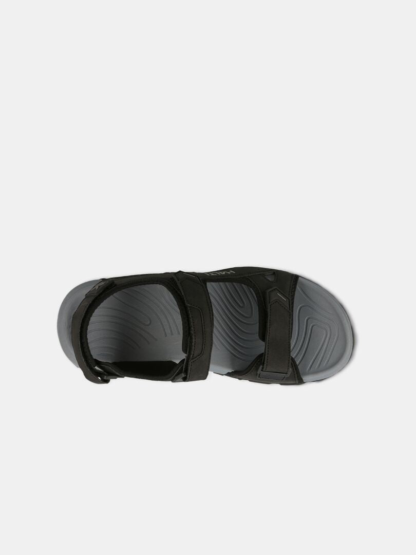 Halti Route 2 Sandal är svart med två kardborreband, en slitstark gummisula och en grå ergonomisk fotbädd, vy uppifrån.