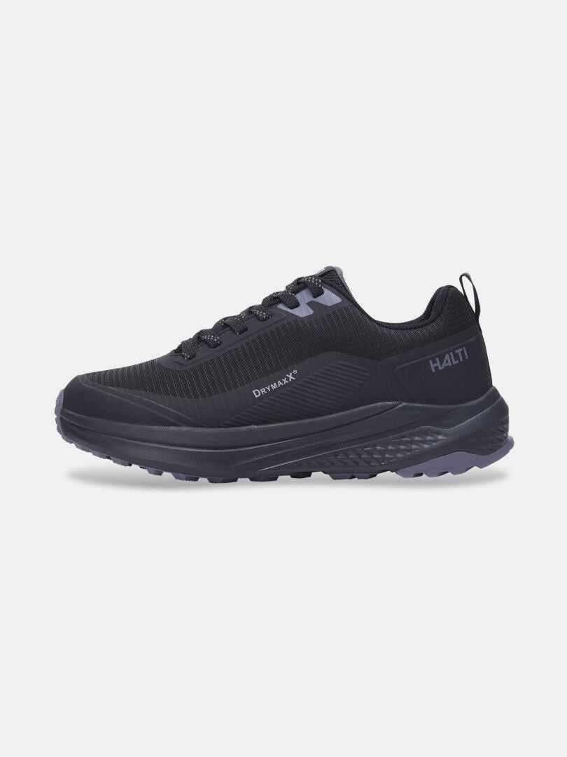 Halti Asento DX friluftsskor för damer: ovandel i svart mesh, strukturerad gummisula, sneaker enligt barfota-principen med noll fallhöjd.