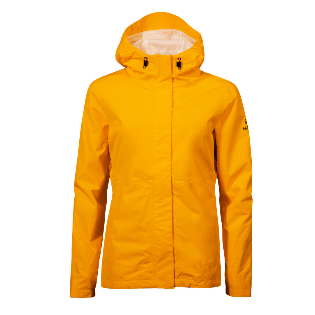 Halti Fort DX Skaljacka Dam i gult, tillverkad av återvunnen polyester med dragkedja fram, långa ärmar och justerbar huva.