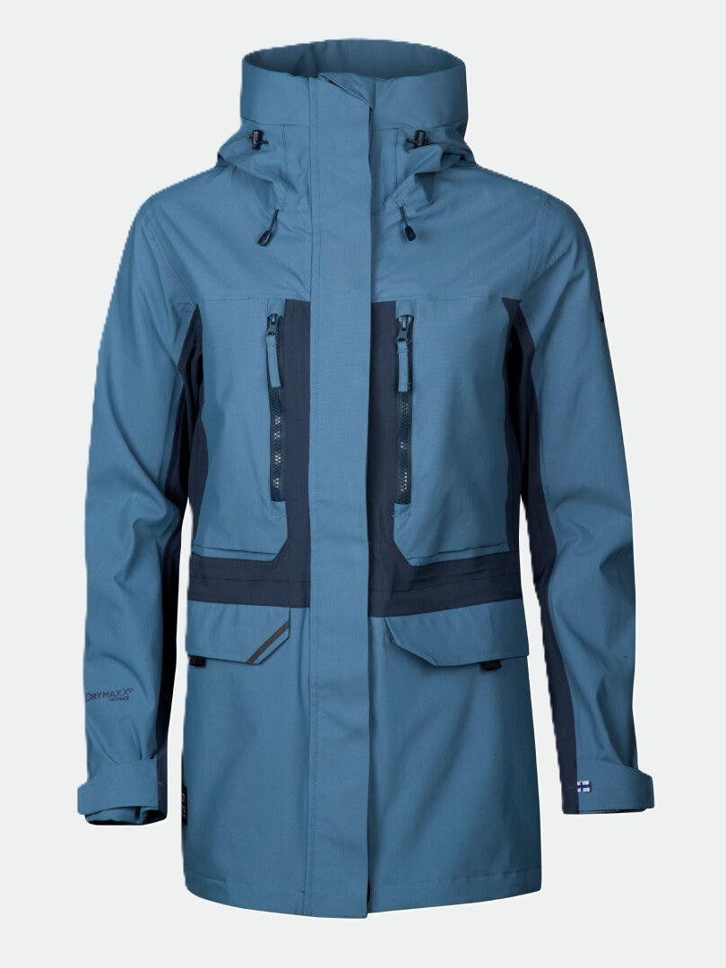 Halti Hiker Dam DrymaxX Parka Jacka i blå/mörkgrå har bröst- och höftfickor med dragkedja och justerbara ärmslut.