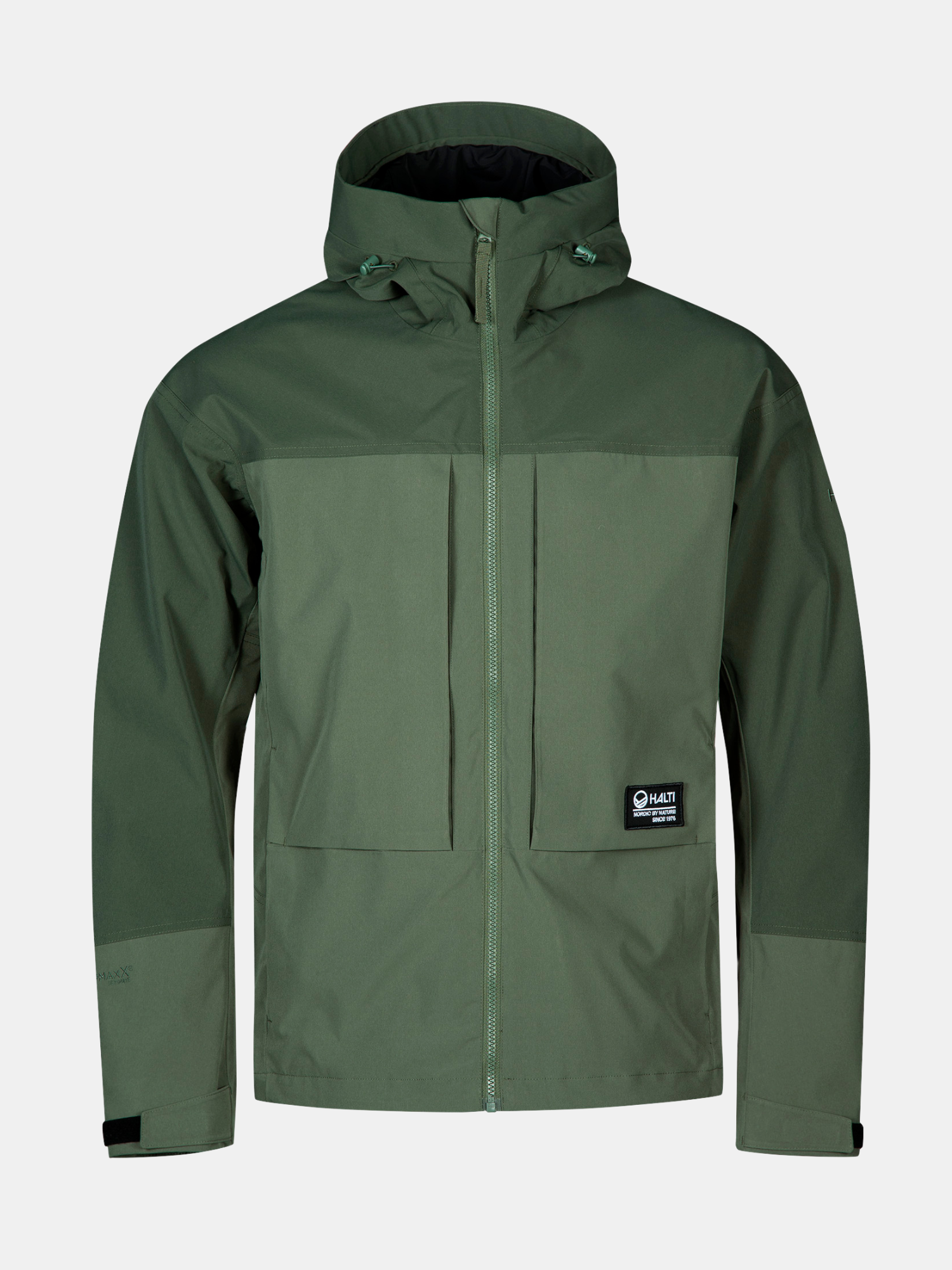 Halti Hiker II DX Skaljacka Herr är grön med dragkedja fram, två bröstfickor och en logopatch nere till vänster.