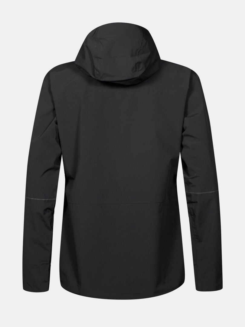 Staala DX Skaljacka Dam Plus från Halti med huva, fotograferad bakifrån på en enfärgad ljusgrå bakgrund.