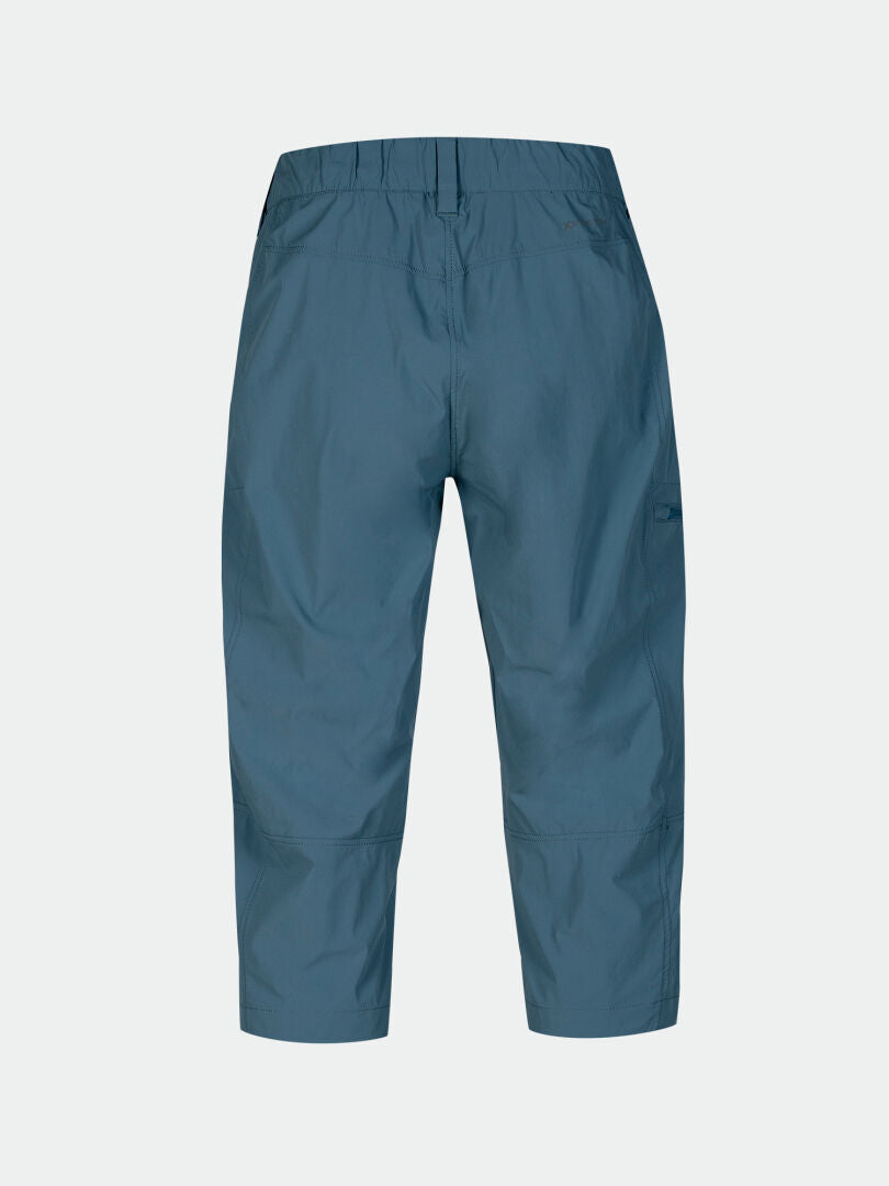 Halti Pallas Cool X-stretch capribyxor dam i blått, UPF 90+, med resår i midjan och raka ben, sedd bakifrån.