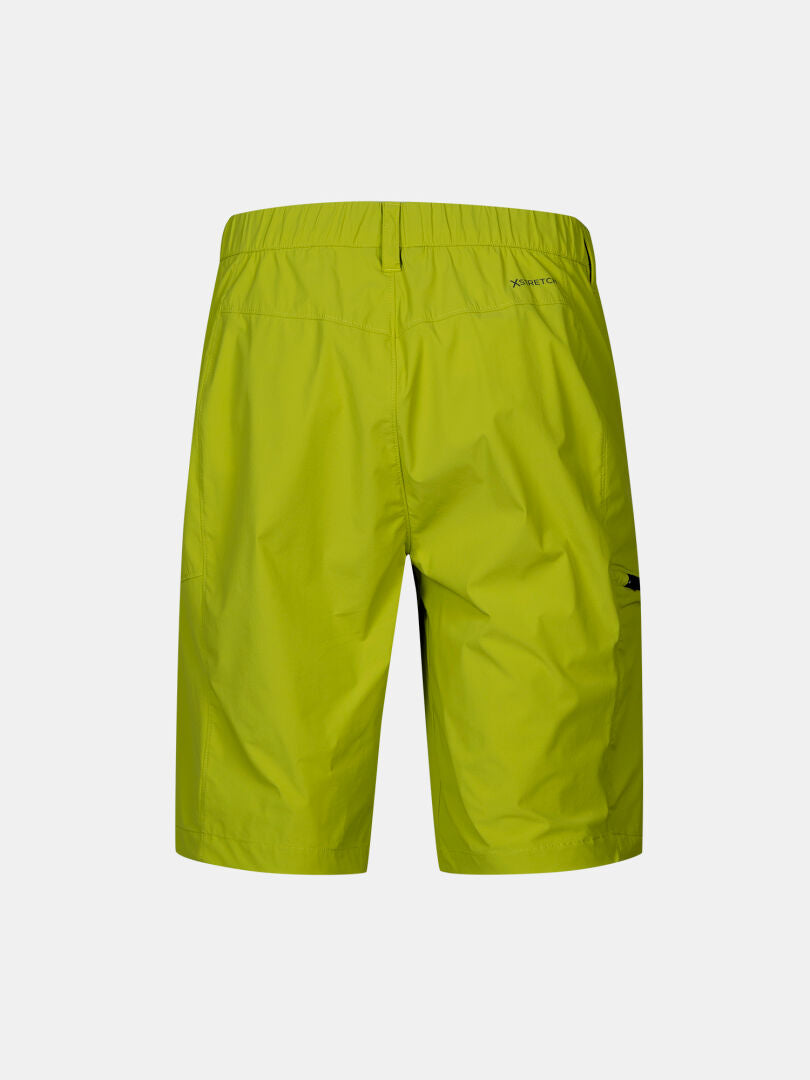Bakifrån på Halti Pallas Cool X-stretch Shorts Herr i limegrönt, UPF 90+, elastisk midja, ficka med dragkedja på höger sida.