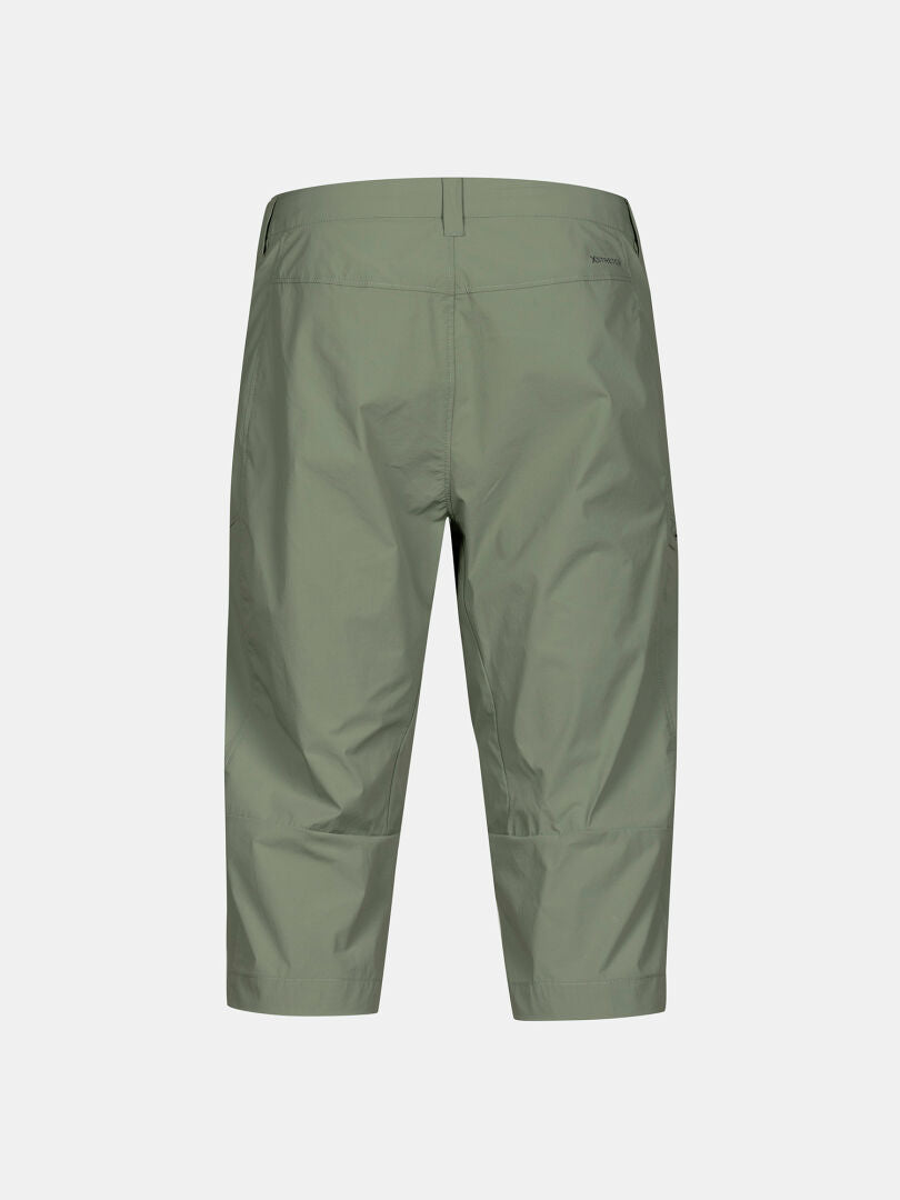Baksidan av Halti Pallas Cool X-stretch Capribyxor Herr i ljusgrönt, knälångt, med rak passform och snabbtorkande tyg.
