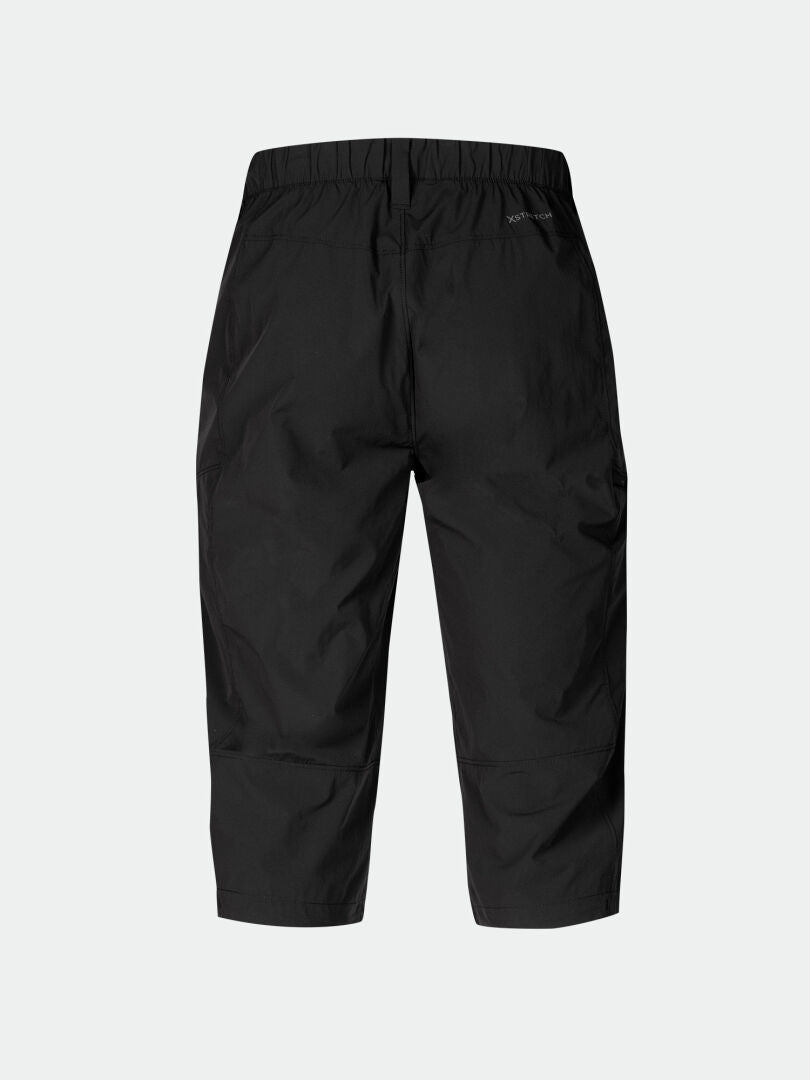 Halti Pallas Cool X-stretch Capribyxor Herr, svarta med elastisk midja och UPF 90+, visa mot ljusgrå bakgrund.