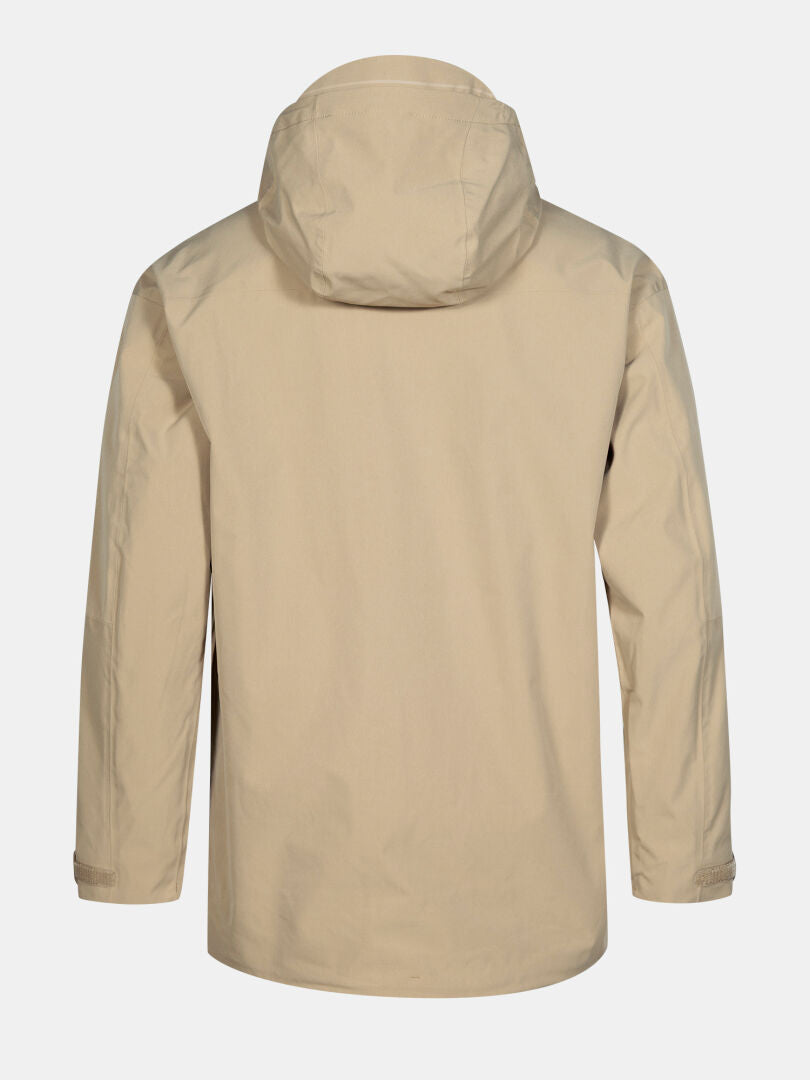 Halti Valaja DX Parka Herr i beige, visad bakifrån med långa ärmar och rak fåll mot en enfärgad bakgrund.