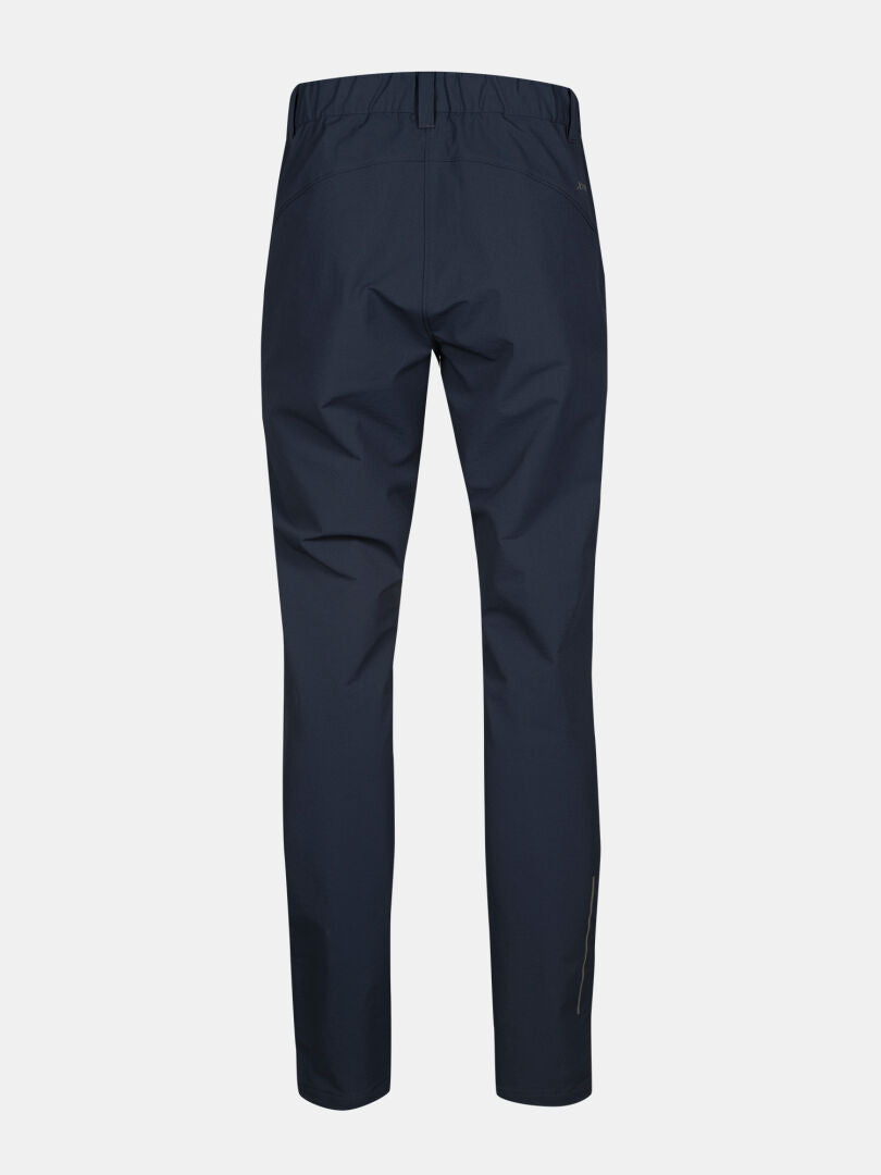 Bakifrån på Halti Finholma X-stretch Byxor Dam Plus i marinblå, med elastisk midja och raka ben.