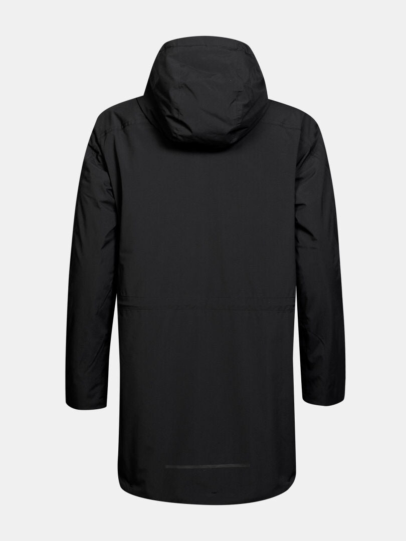 Halti-parkas ”Kortteli DX Insulated Parka Dam” sedd bakifrån, svart, med huva, mot en enfärgad vit bakgrund.