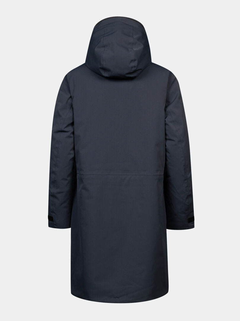 En Halti Kallio DX Parka för dam i marinblått visas bakifrån mot en enfärgad vit bakgrund.