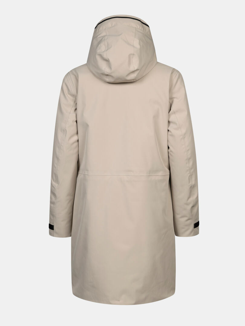 Kallio DX Parka Dam från Halti i beige, bakifrån med långa ärmar och svarta remmar vid ärmsluten.