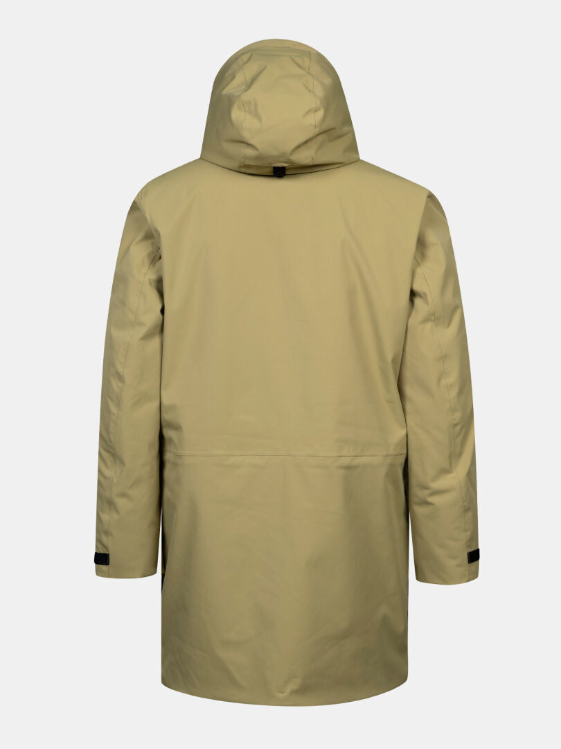 En khakifärgad Halti Kallio DX Parka Herr visas bakifrån mot en enfärgad vit bakgrund.