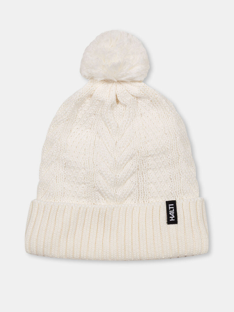 Halti Hile Mössa-mjukt flätstickad vintermössa med tofsar, ribbstickad kant och liten
