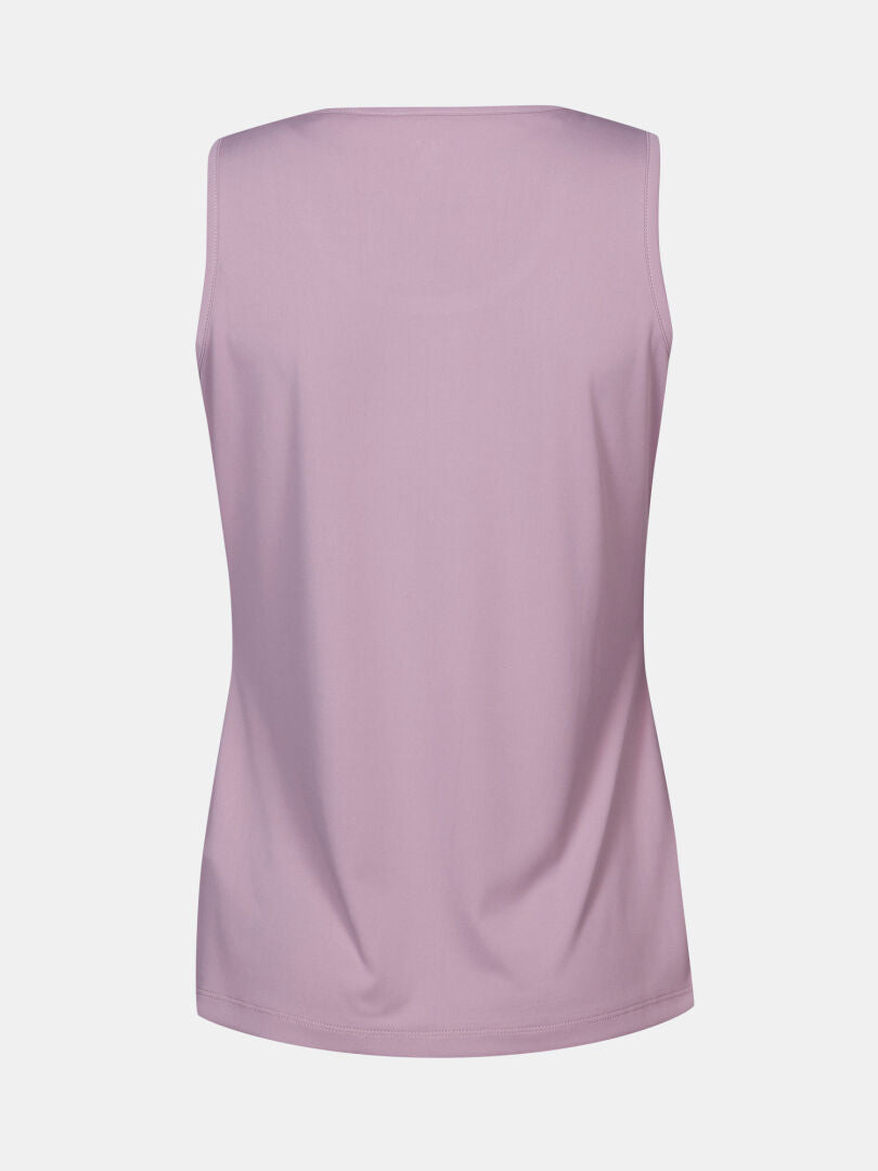 Halti Salves Topp Dam, ärmlöst lavendelfärgat linne i återvunnen polyester, bakifrån mot vit bakgrund.