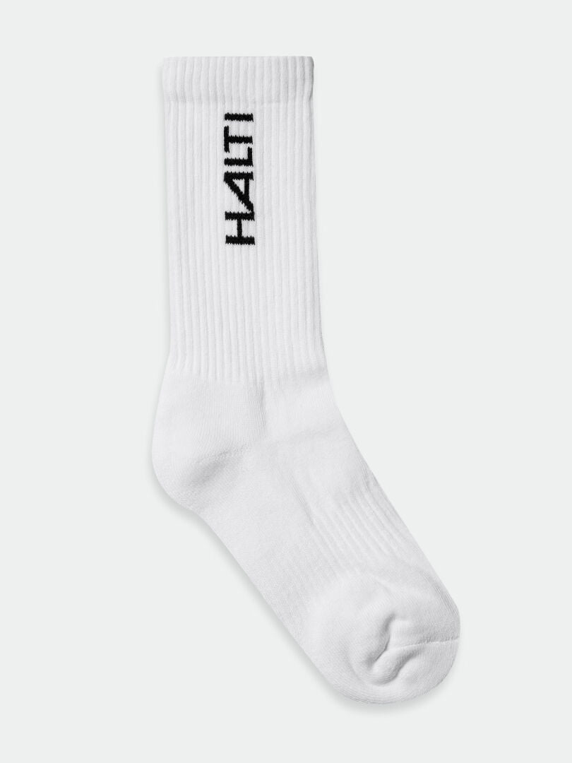 Halti Outdoor Sport Crew Strumpor 3-pack: vita crewstrumpor för dagligt bruk eller vandring, med HAITI i svart text.