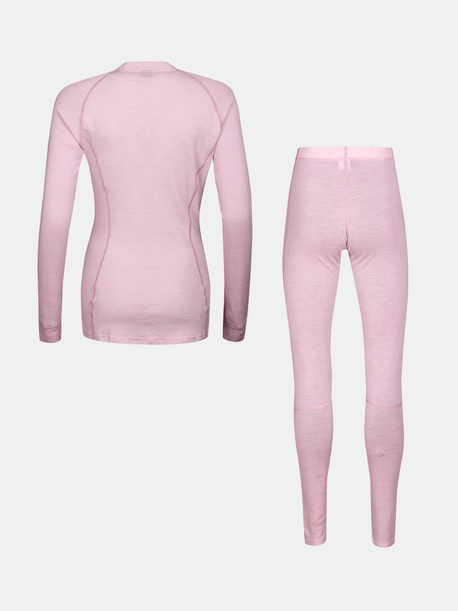 Halti Hossa Merinoull Underställ Set Dam i ljusrosa, med långa ärmar och matchande leggings på en vit bakgrund.