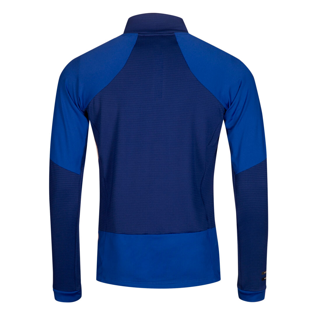Halti HeatGrid Mellanlager Herr: blå vandringsjacka i återvunnen polyester med mörka paneler.