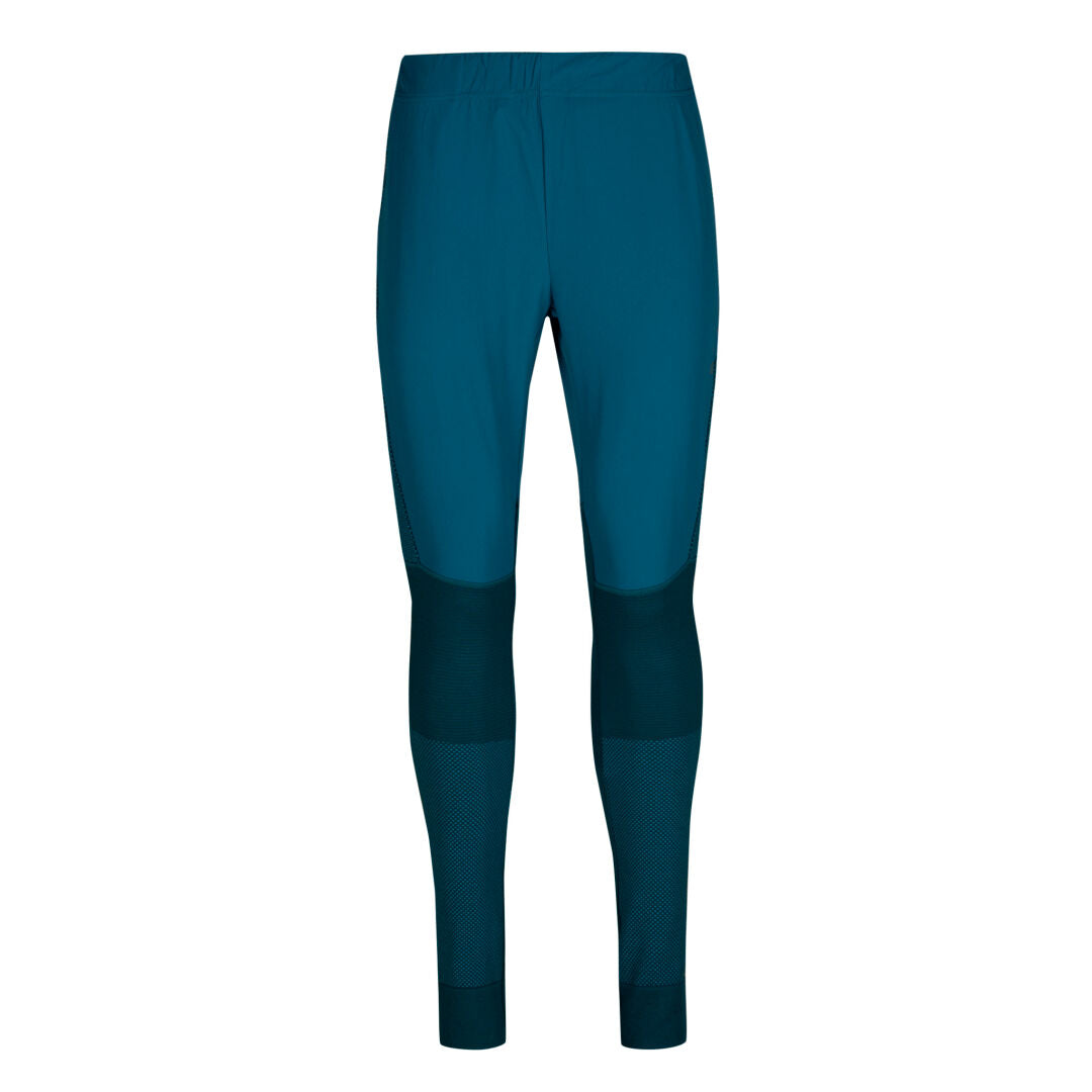 Halti Tracks Seamless Tights Dam i teal har mörka meshpaneler vid knän och underben, på en vit bakgrund.