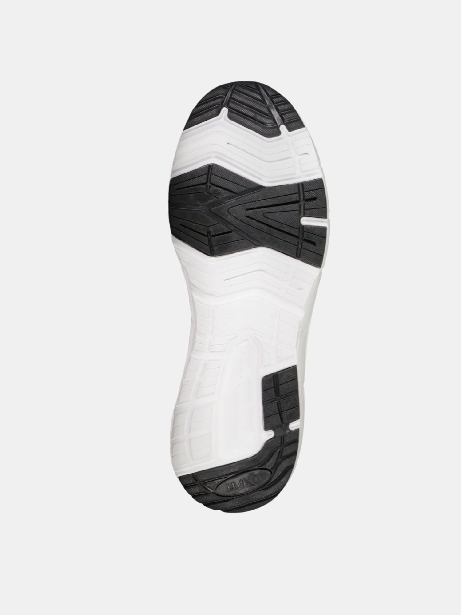 Bilden visar den svartvita GripmaxX Lite-sulan på Halti Lester Sneakers Dam, sedd underifrån mot en vit bakgrund.