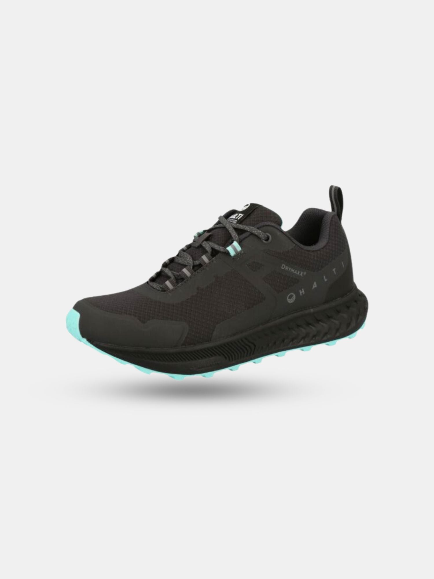 Halti Pallas Low 2 DrymaxX Hybrid Sneaker Dam i svart med turkosa detaljer, Michelin Offroad-sula, på en ljus bakgrund.