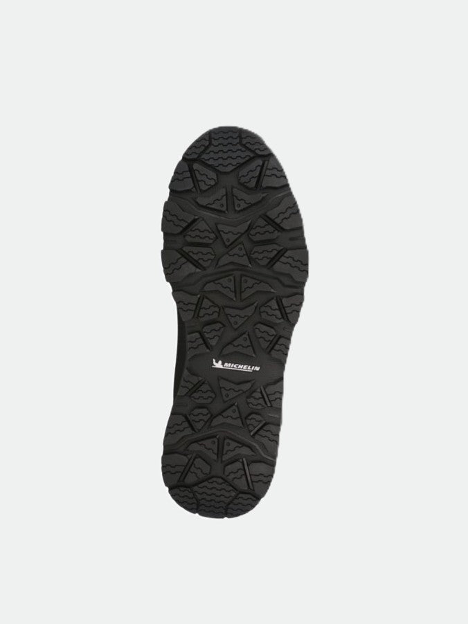 Svart sula med robust, geometriskt mönster och Michelin Ice Control-logotyp på Halti Buli Low 2 DX Freelock Friktionsskor.