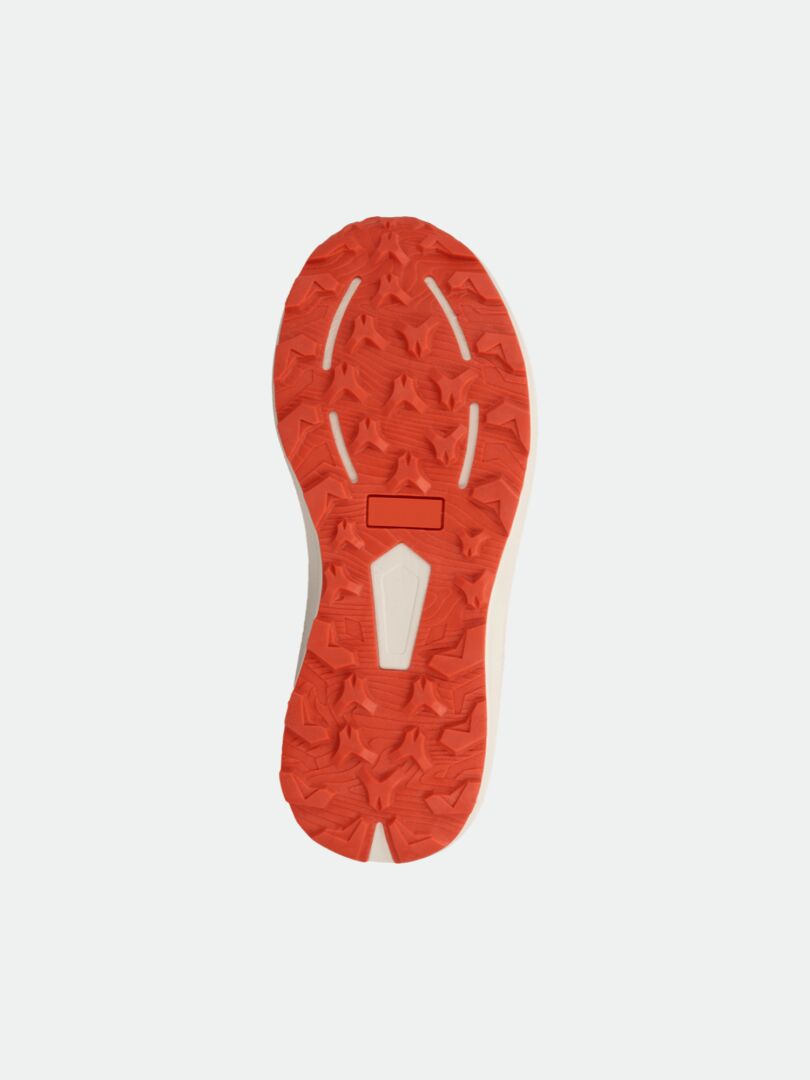 Halti Rapid DX Mid Outdoorskor Dam, som visas nedifrån, har en orange texturerad sula med stjärnformade slitbanor.