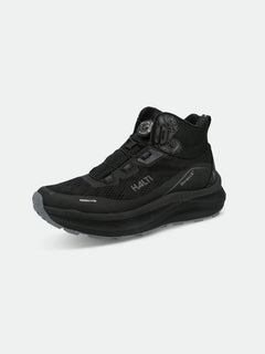 Halti Rapid Mid Freelock DX Skor Unisex är en sneaker i svart mesh med snörning och en tjock sula för vandring.