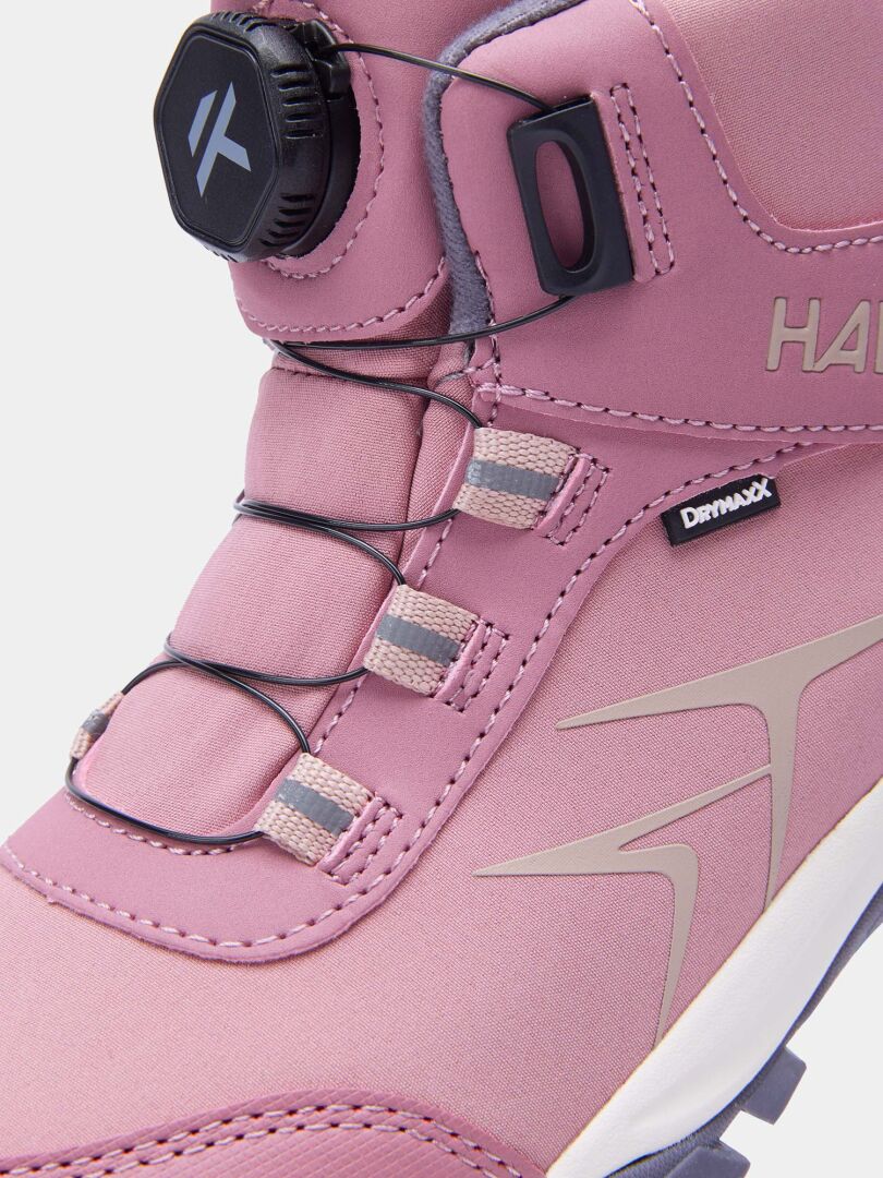 Närbild på en rosa, vattentät Halti Tribe Dada DX Outdoor Skor Junior-sko med ett snörningssystem med rund ratt.