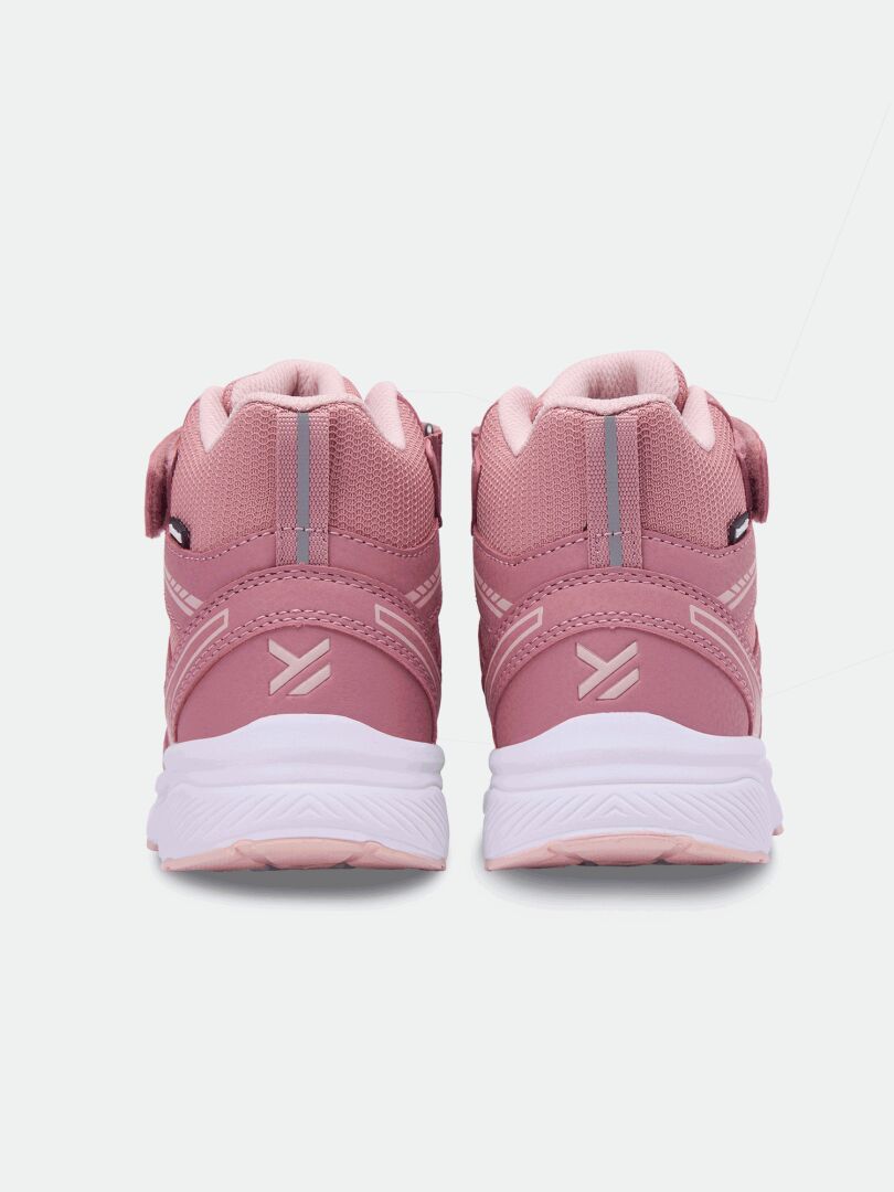 Halti Zuma Mid DX Sneaker Junior i rosa, med vita sulor och kardborreband, sett bakifrån.