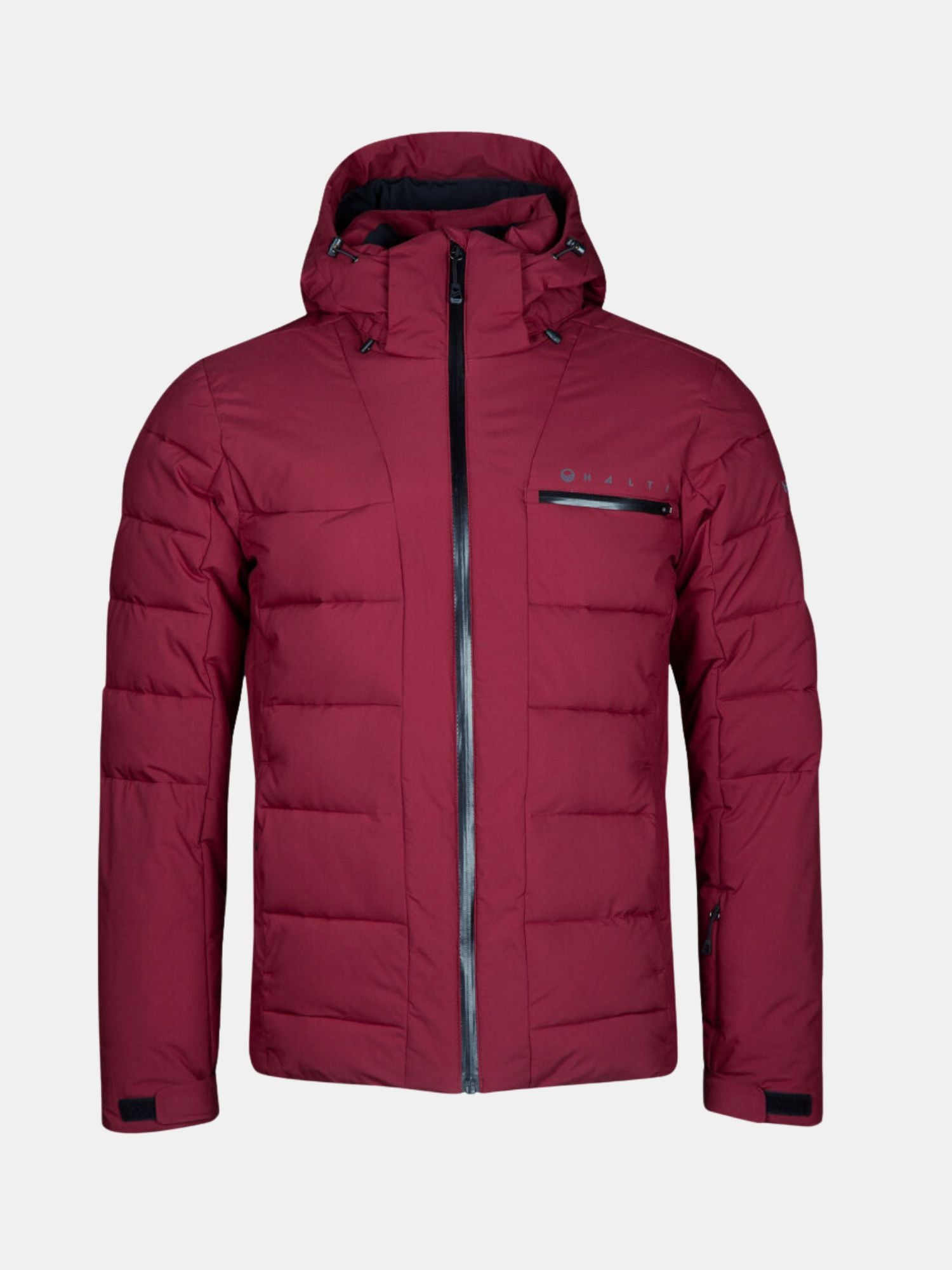 Halti Nordic Lite Skidjacka Herr, en rödbrun puffer med huva och bröstficka, visas på en enfärgad bakgrund.