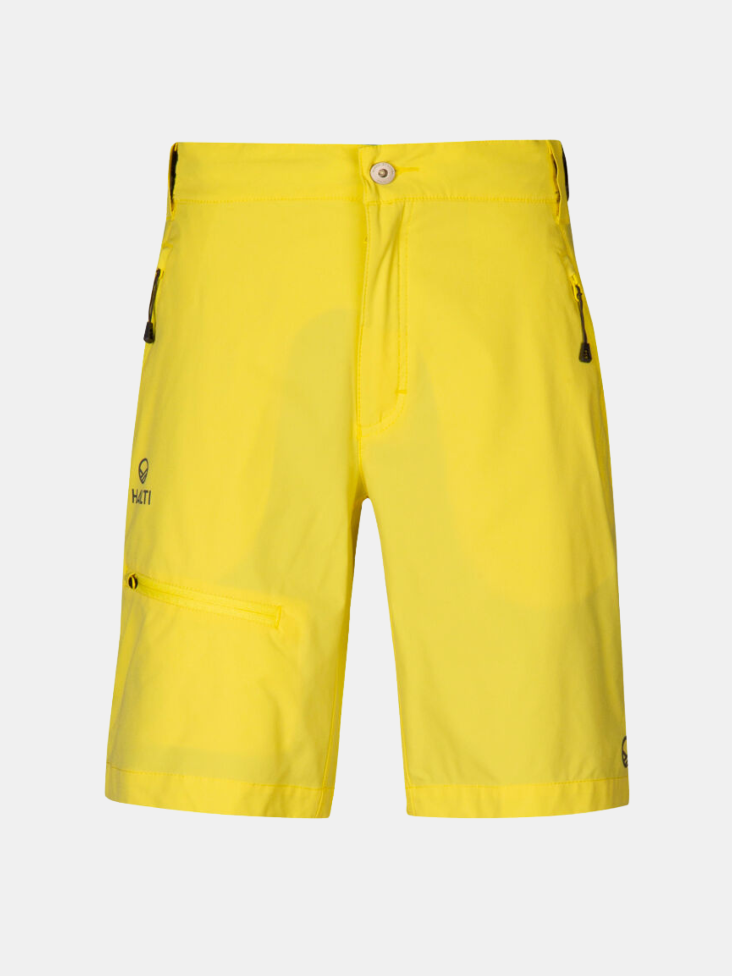 Halti Pallas Dam X-stretch Lite Shorts i ljusgul färg med fickor med dragkedja, på en vit bakgrund.