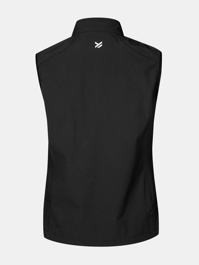 Bakifrån på Halti Pallas Evo X-stretch Väst Dam i svart, med liten vit logotyp och flexibelt X-stretch-material.