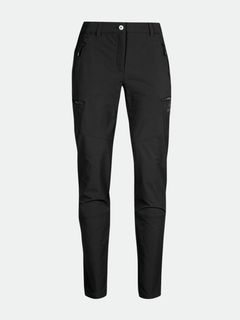 Ett par Halti Pallas Evo Brushed X-stretch Byxor Dam, svart slim-fit med blixtlås, på ljusgrå botten.