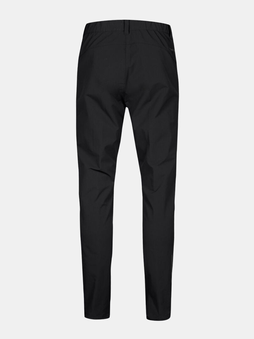 Bakifrån på Halti Finholma X-stretch Byxor Herr, raka ben och elastisk midja, mot en vit bakgrund.