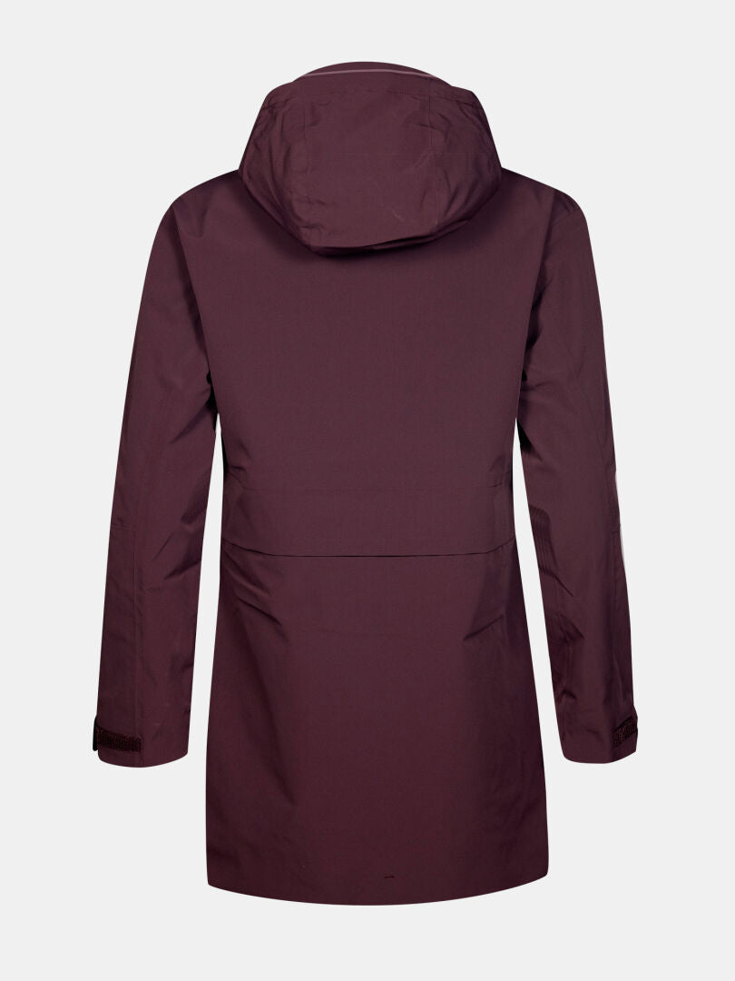 Halti Valaja DX Parka Dam Plus i rödbrun färg visas bakifrån på en vit bakgrund.