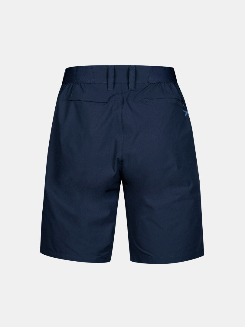 Halti Drive X-stretch Shorts Dam i marinblått visade bakifrån med bälteshällor och två bakfickor.