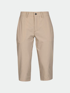 Halti Drive X-stretch Capribyxor Dam: beige knälånga shorts med UPF 50+, dragkedja, knapp, bälteshällor och sidofickor.
