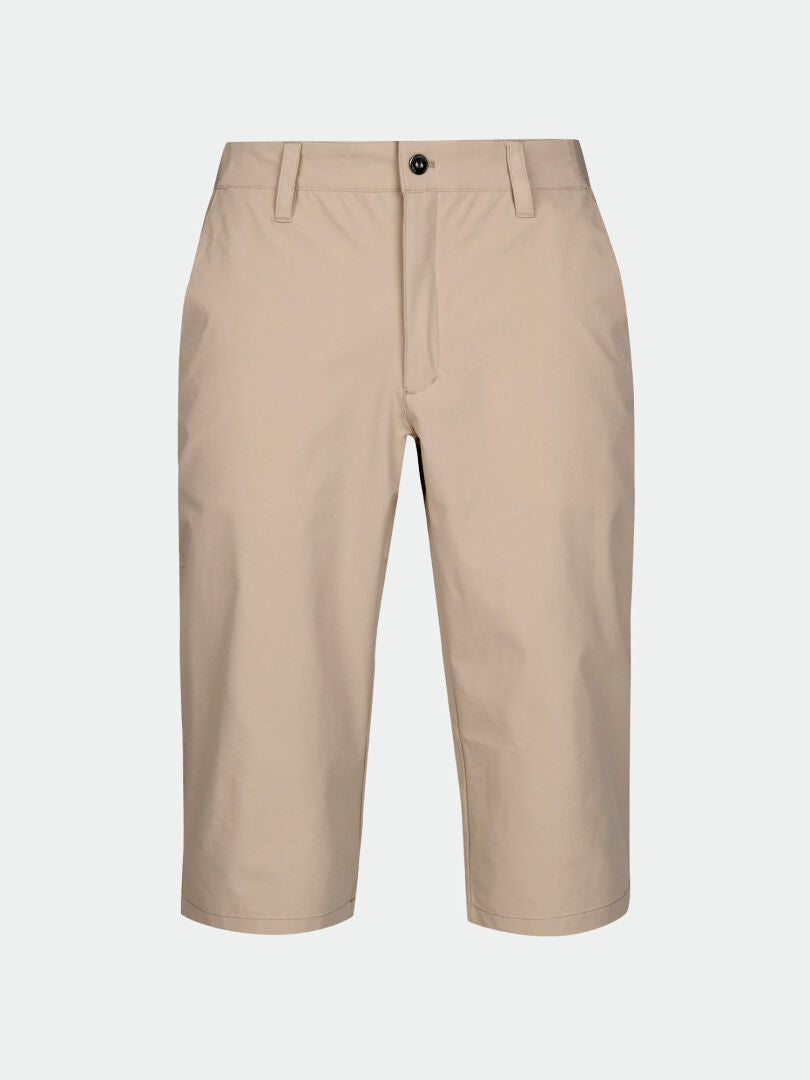 Halti Drive X-stretch Capribyxor Herr i beige, knälång, vattenavvisande, med bälteshällor och dragkedja fram.