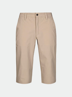 Halti Drive X-stretch Capribyxor Herr i beige, knälång, vattenavvisande, med bälteshällor och dragkedja fram.