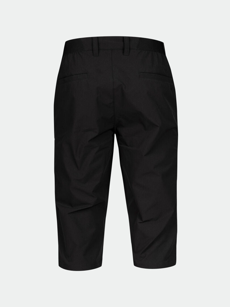 Bakifrån av Halti Drive X-stretch Capribyxor Herr, svart, UPF 50+, bältad, knälång, två passpoalfickor bak.