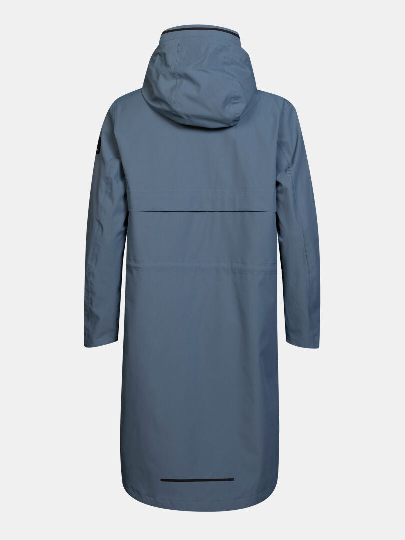 Halti Tokoi II DX-parkas för damer i blått, med rak passform och minimalistiska detaljer, visad bakifrån för en urban stil.