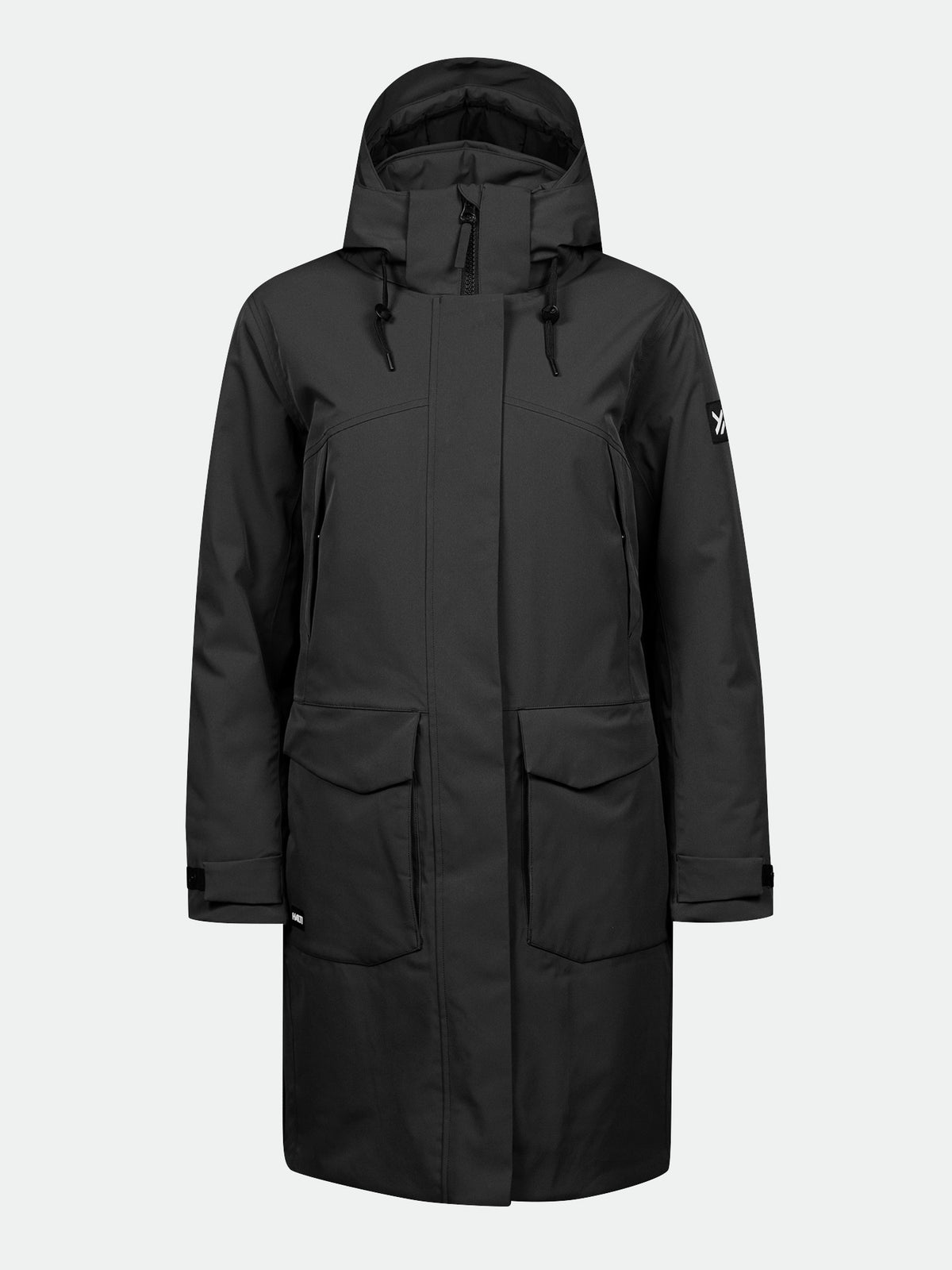 Halti Kallio DX Parka Dam: lång svart vinterparkas med DrymaxX, två stora framfickor och justerbara ärmslut (se bild).