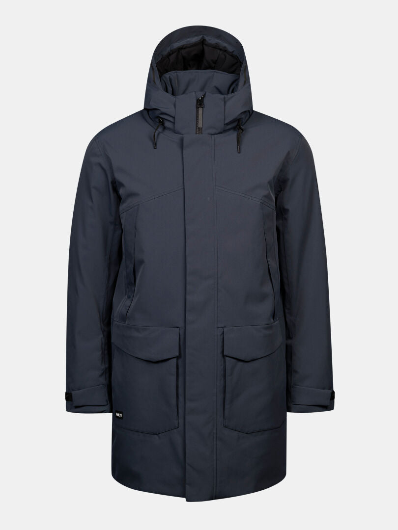 Halti Kallio DX Parka Herr är en mörkblå DrymaxX-parkas med dragkedja fram, stora fickor och justerbara ärmslut.