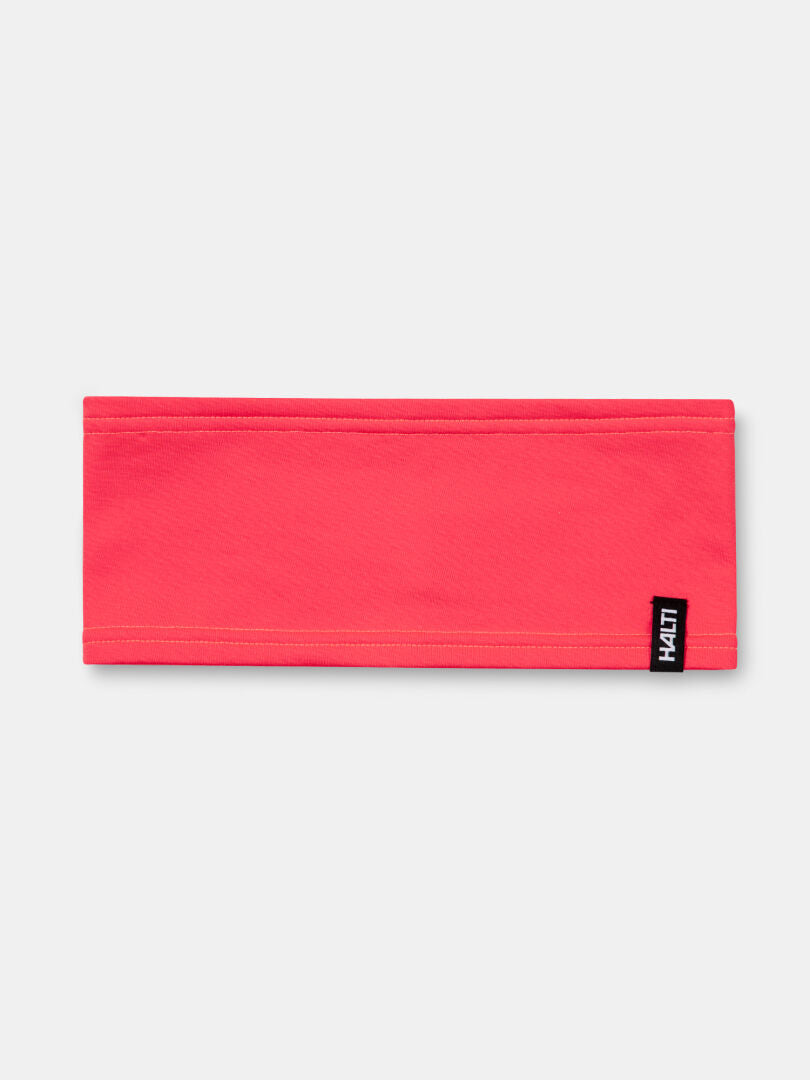 Halti Loiva Pannband är en ljusrosa Active Dry Jersey av återvunnen polyester med en svart/vit HALTI-tagg.